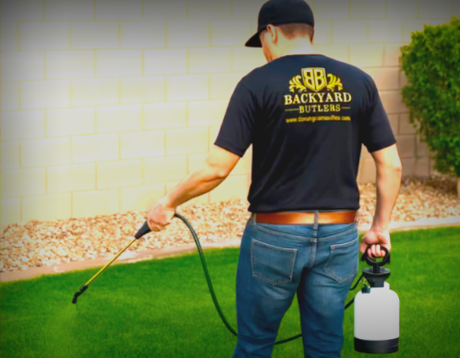 An employee sprays your yard for bugs and creates a bug barrier with our Yard Guard eco-friendly product!
